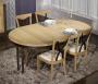 Table ronde pied central Anna ralise en Chne Massif de style Louis Philippe DIAMETRE 120 - 2 allonges de 40 cm Finition Chne Bross Naturel et Noir dlav