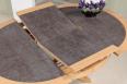 Table ronde Contemporaine Romain, diamtre 120 cm ralise en chne avec un pieds central et 1 allonge portefeuille de 50 cm Cramique Iron Grey
